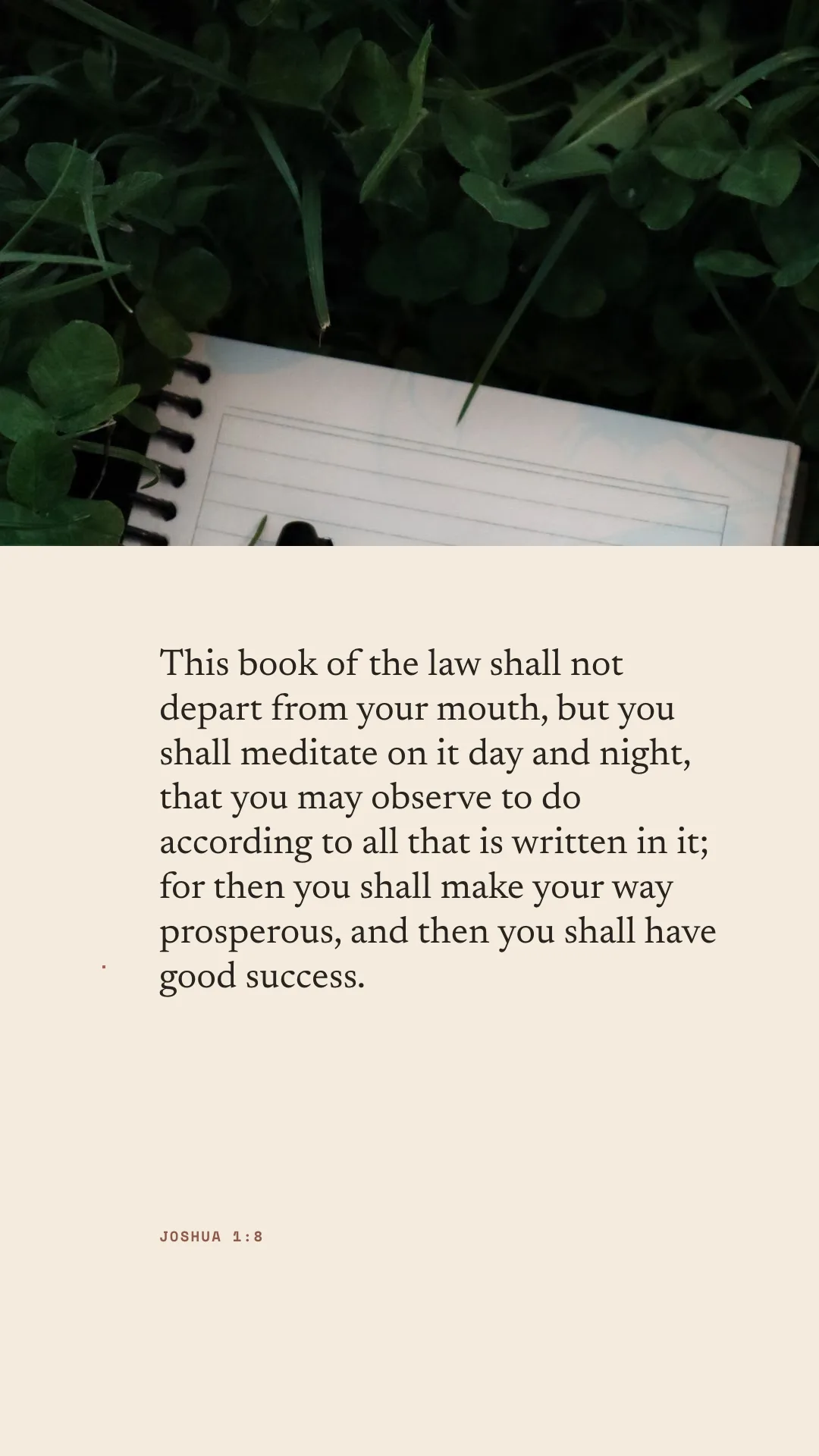 A tall verse design with a notebook in grass above the words of Joshua 1:8.